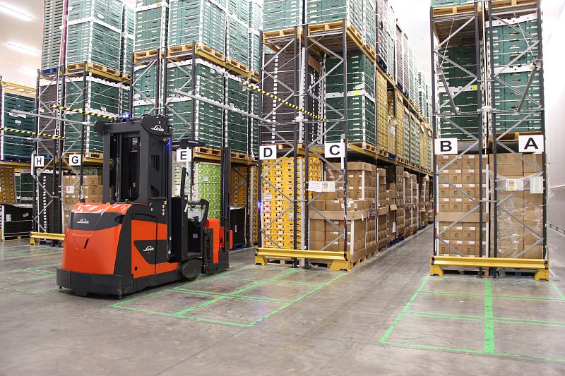 lazer guided fork lift in warehouse