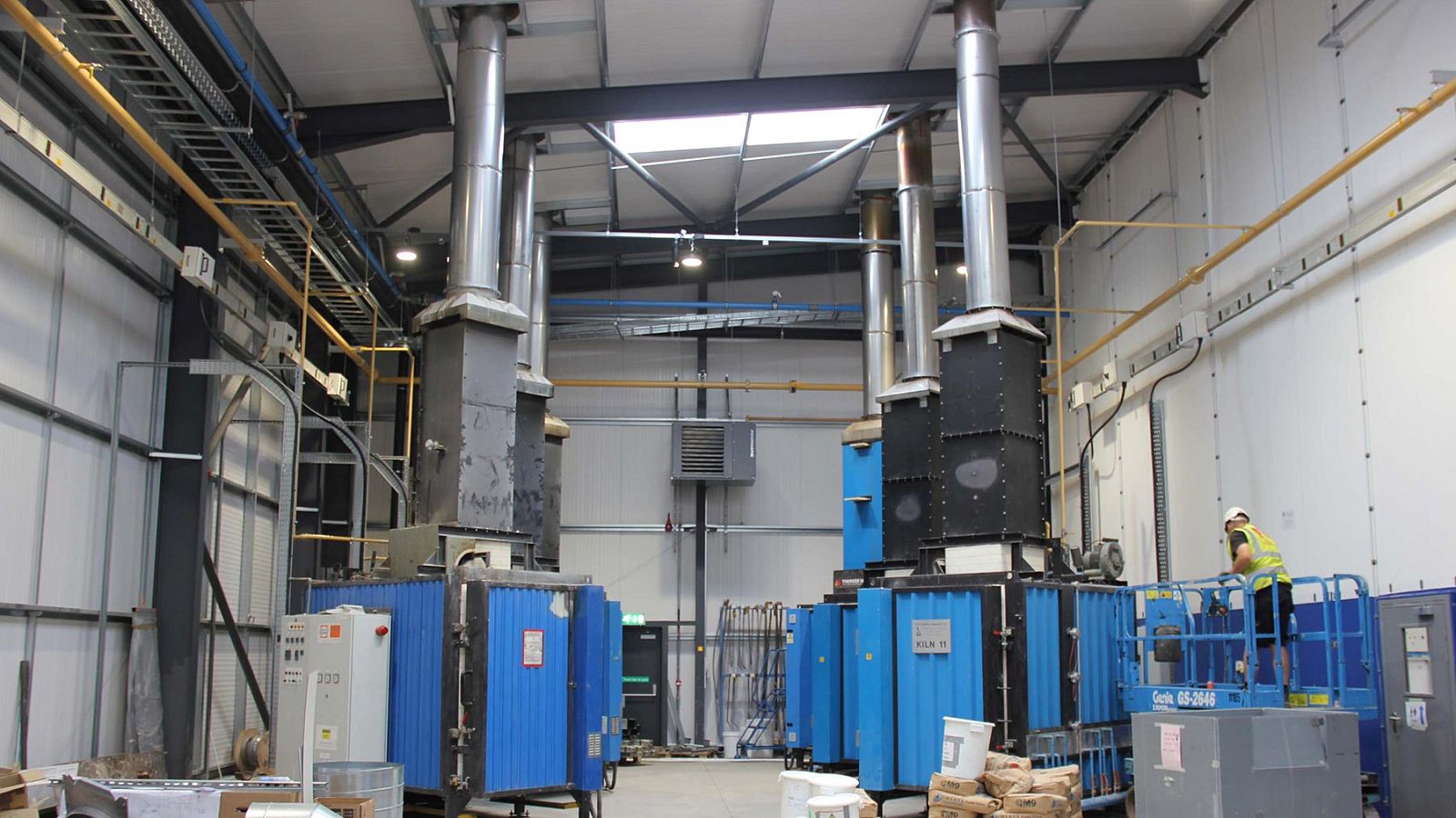 Factory extension with new offices and HGV access.